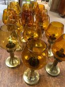 Collection of of 16 brass Mason 'constant flame' candle lamps with amber glass shades, each approx