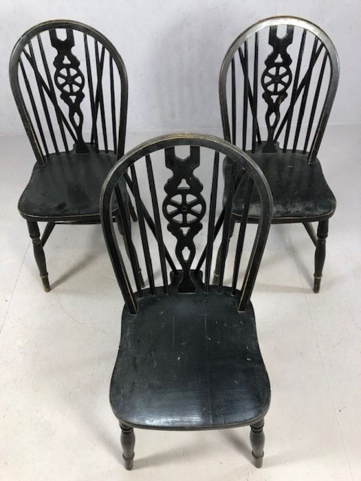 Set of three black Windsor wheel back dining chairs - Image 3 of 3