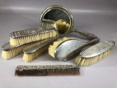 Collection of silver hallmarked dressing table items to include mirror, brushes etc