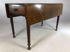 Antique Pembroke table on turned legs with single drawer to one end, approx 122cm x 62cm (flaps