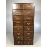 Antique tall boy / chest of drawers consisting of sixteen drawers, four with locks (no keys), all