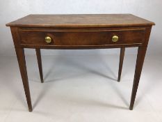 Antique writing desk with single drawer on tapering legs with bow front, appprox 92cm x 49cmm x 73cm