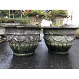 Pair of circular concrete pots