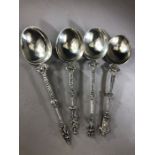 Four Continental silver apostle/ figural spoons, hallmarks to reverse each approx 175mm and total