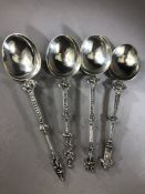 Four Continental silver apostle/ figural spoons, hallmarks to reverse each approx 175mm and total