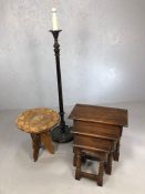 Nest of three wooden tables and a carved folding inlaid table with a wooden standard lamp (3)