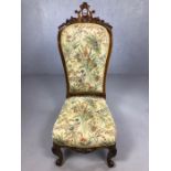 Carved wooden framed occasional chair with floral fabric upholstery, approx 110cm tall