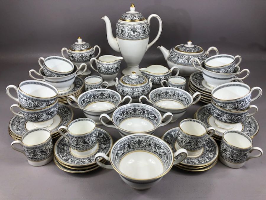 Wedgwood 'Florentine' black and gilt tea and coffee set to include coffee pot, sugar bowl, cream