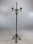 Wrought iron Arts and Crafts adjustable twin arm candelabra, approx 162cm tall