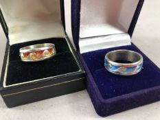 Two silver rings with Wave style decoration approx size 'P' both boxed