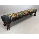 Antique wooden framed, upholstered kneeler on ball and caw carved feet, approx 105cm x 22cm x 22cm