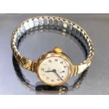 9ct Gold Watch by EXCALIBUR, 17 Jewels INCABLOC movement, silver dial.