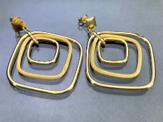 Pair of large 9ct Gold earrings of sets of three graduating Gold squares (dent to one) approx 38mm