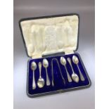 Boxed hallmarked set of silver, six teaspoons and sugar nips hallmarked for Sheffield by maker James