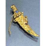 9ct Gold gold Pendant (375) of an Eastern Dagger set with gem stones approx 36mm long and 3.5g