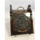 Wooden decoratively carved coal scuttle with brass handles