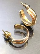 Pair of Gold earrings unmarked but tests as Gold, three colour twisted design approx 9.5g