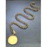 Half Sovereign dated 1909 in a 9ct Gold mount on a 9ct Gold hallmarked chain approx 74cm long and