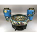 Three Chinese cloisonne items: a bowl, of squat circular form, decorated with floral decoration,