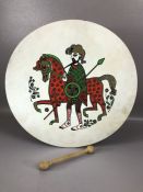 Welsh folk drum, approx 46cm in diameter, with a figure of a man and horse, with double ended