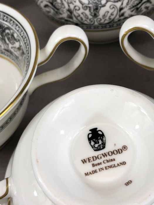 Wedgwood 'Florentine' black and gilt tea and coffee set to include coffee pot, sugar bowl, cream - Image 6 of 7