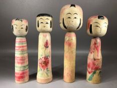 Set of four Japanese Kokeshi Dolls, the tallest approx 24cm in height