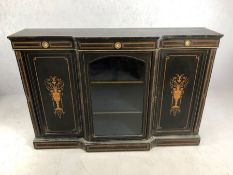 Ebonised and walnut, break front credenza, central glazed section containing blue velvet lined