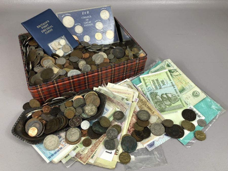 Large collection of coins and bank notes