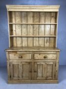 Antique pine dresser with shelves over, two drawers and cupboards under, approx 136cm x 44cm x 195cm