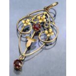 Antique 9ct Gold floral pendant set with red gemstones approx 40mm x 25mm