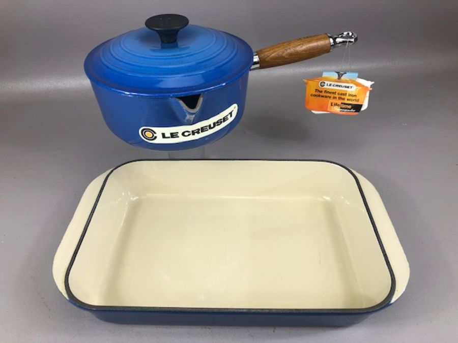 Kitchenware: two pieces of Le Creuset a roasting dish and pan with Lid