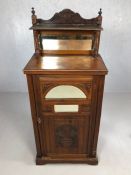 Antique cupboard with carved detailing, bevel edged mirrors and gallery above, approx 53cm x 36cm