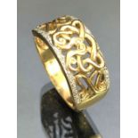 9ct Gold ring with twisted pattern design and set with diamonds approx size 'Z' and 7.1g