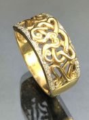 9ct Gold ring with twisted pattern design and set with diamonds approx size 'Z' and 7.1g