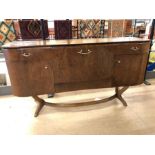 Mid Century 'Beautility' cocktail sideboard with central fall front cupboard flanked by two side