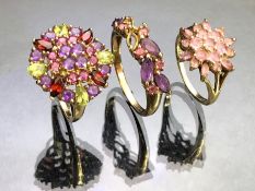 Three fancy 9ct Gold rings set with colourful gemstones (total weight approx 11.2g)