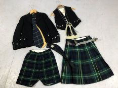Child's Scottish costume: Tartan kilt, shorts, jacket, waistcoat, sporran and hat. Kilt approx.111cm