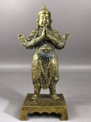 Gilt bronze study of a Chinese scholar, in standing position, hands together, approx 23c in height