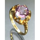 9ct Gold ring set with faceted Amethyst on a raised setting size 'L' and gross weight approx 2.2g