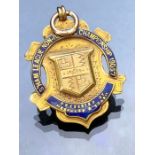 9ct Gold twin colour hallmarked medal with 9ct gold ring and blue enamel detailing approx 9.1g