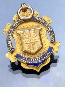 9ct Gold twin colour hallmarked medal with 9ct gold ring and blue enamel detailing approx 9.1g