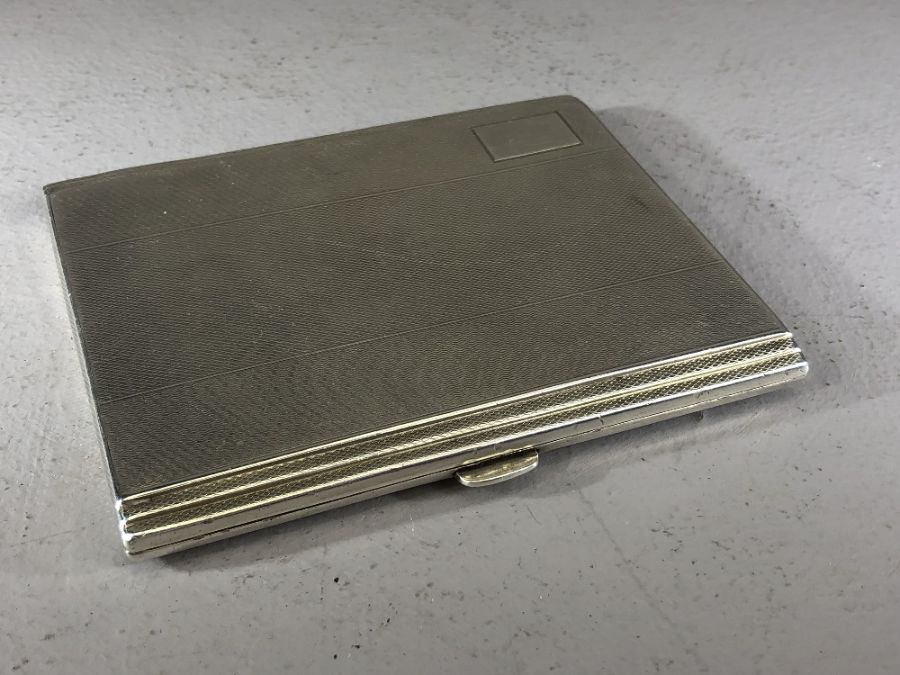 Silver hallmarked cigarette case with art deco styling Birmingham by maker W T Toghill & Co approx