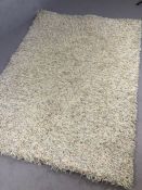 Modern Habitat cream ground woollen rug, approx 200cm x 150cm