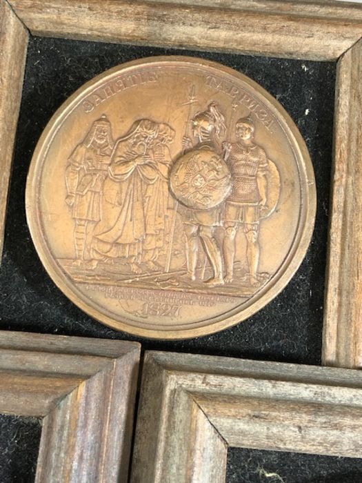 Collection of seven framed medallions, each approx 6.5cm in diameter, depicting military scenes, - Image 6 of 8