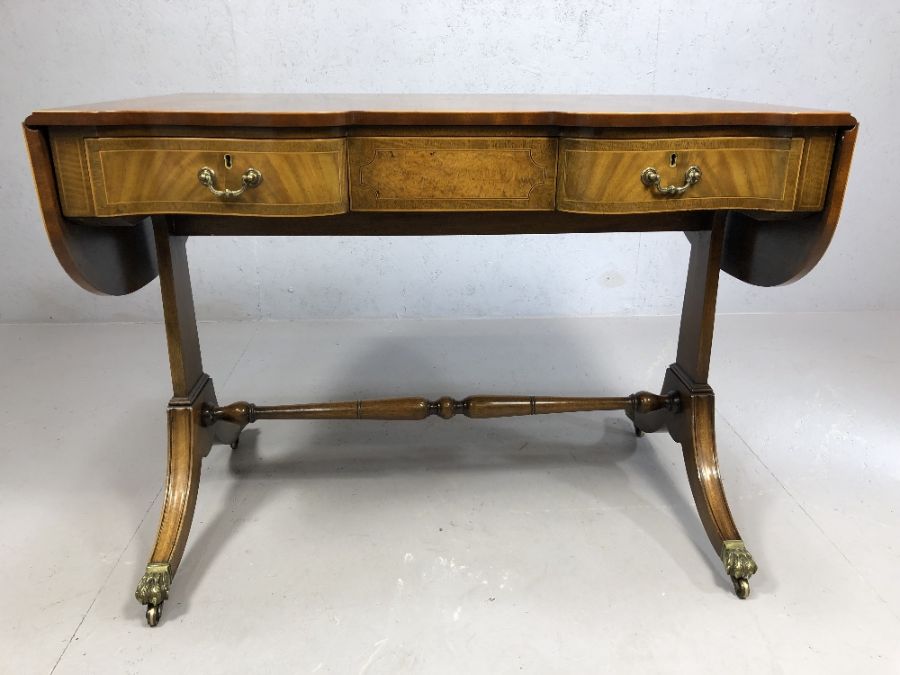 Fine quality reproduction regency writing desk with two drawers, turned stretcher, on splayed