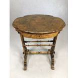 Antique oval occasional table with multiple turned stretchers, single drawer with compartments and