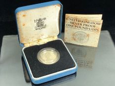 United Kingdom Silver Proof One Pound coin with paperwork and presentation box