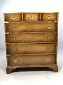 Brass bound campaign chest of seven drawers with brass flush circular handles, approx 77cm x 46cm