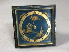 Japanese brass square faced clock with landscape scene to face and dial with Roman numerals,