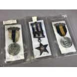 Collection of three Dorset School attendance medals: 1918, 5 Year star 1912-1917 and George V